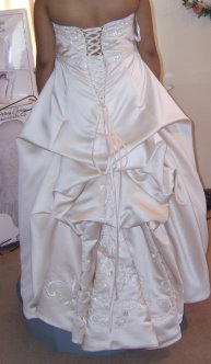 Pregnant bride with lace up back